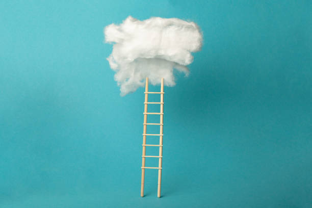 istock Stepladder into clouds, entrepreneur business success concept. Progress and growth up 1183972471