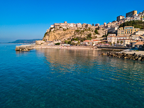 Aerial view of Pizzo Calabro, pier, castle, Calabria, tourism Italy. Panoramic view of the small town of Pizzo Calabro by the sea. Houses on the rock.