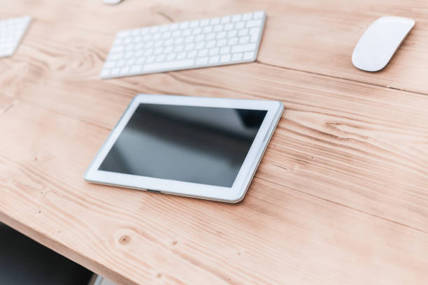 istock close up. digital tablet on the office Desk 1183976572