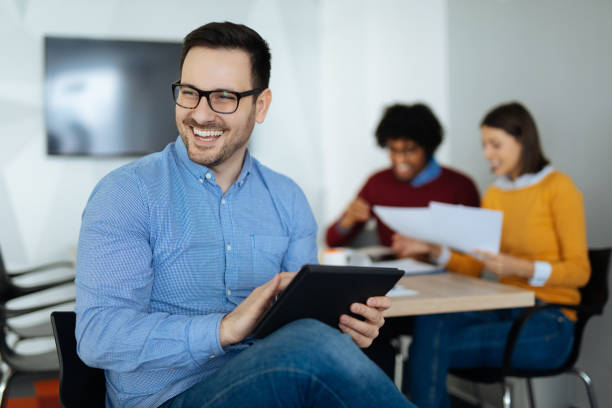 istock Businessman using digital tablet in the office 1183979082