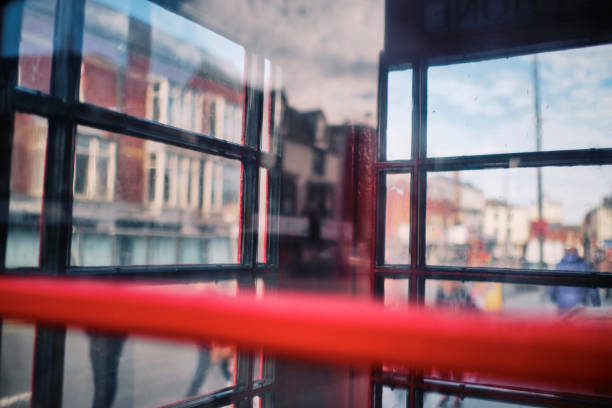 Defocused urban views through Telephone box glass, Blackpool.