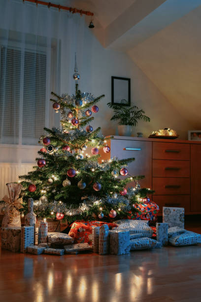 istock Christmas Tree and Christmas gift boxes 1183983500
