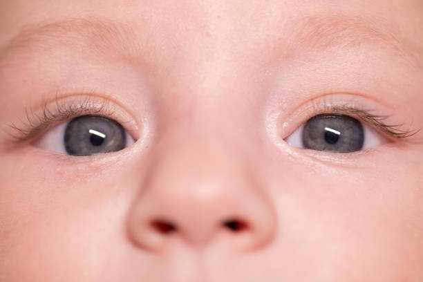istock Cute baby boy with blue eyes 1183985002