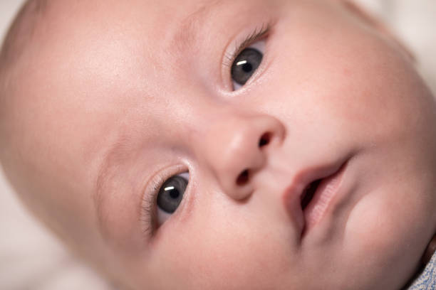 istock Cute baby boy with blue eyes 1183985038