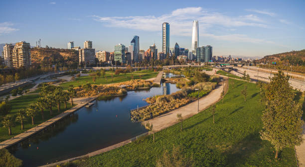 Aerial view of road jungtion and Manquehue hill from Vitacura bicentennial park on a clear day in Chilean capital Santiago stock photo