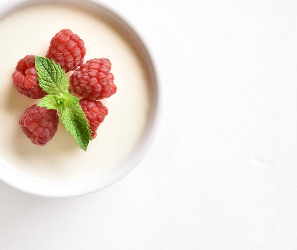 istock Panna cotta with fresh raspberries 1183991044