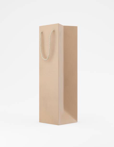 istock Eco packaging mockup bag kraft paper with handle half side. Tall narrow brown template on white background promotional advertising. 3D rendering 1183991497