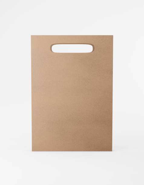 istock Eco packaging mockup bag kraft paper with handle front side. Standard medium brown template on white background promotional advertising. 3D rendering 1183993843