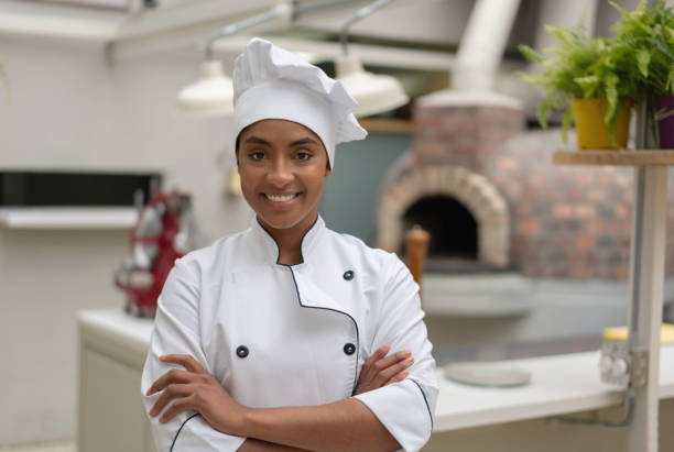 istock Chef looking very happy working at a restaurant 1183994207