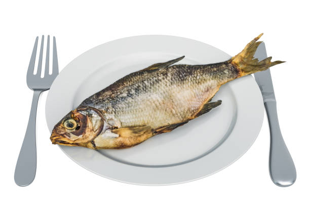 Salty dry fish on plate with fork and knife, 3D rendering isolated on white background
