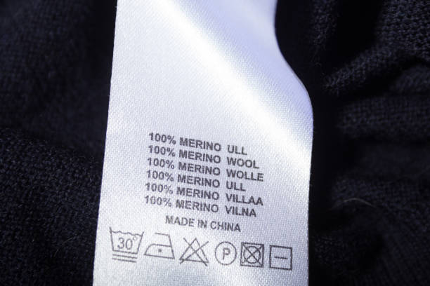 istock Label on the sweater. 100 merino wool 1183996703