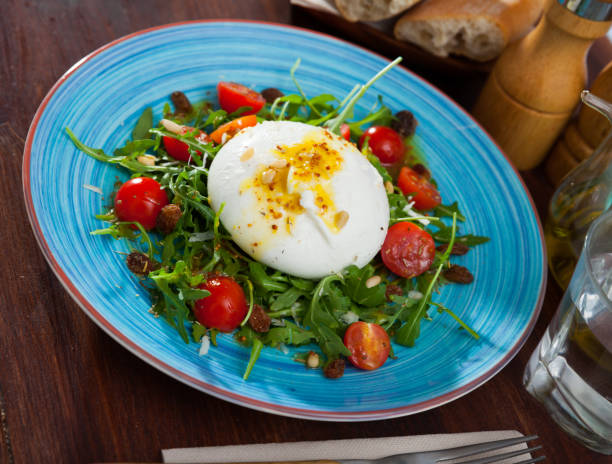 istock Salad with Italian burrata cheese; arugula and cherry tomatoes 1183998135