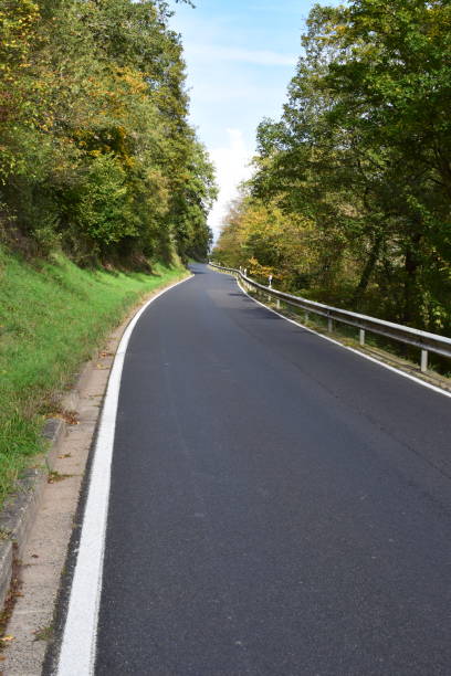 istock steep narrow road into Mosel valley 1183998749