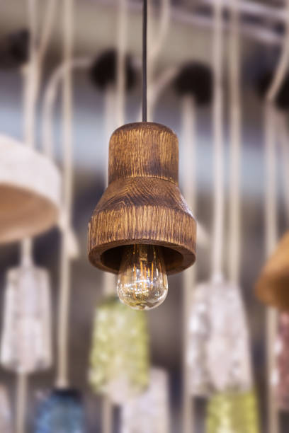 istock Beautiful wooden modern ceiling lamp interior contemporary decoration. selective focus 1183998793