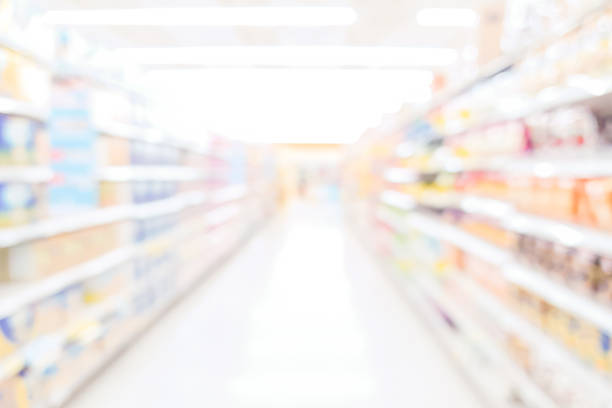 istock abstract blurred inside interior of local supermarket corridor path with aisle distribution shelf in snack or dried food zone for background design concept 1183998950