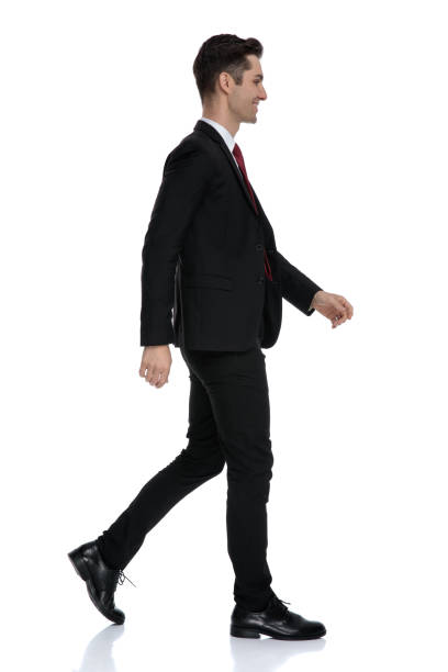 istock Side view of a happy businessman smiling 1184000126