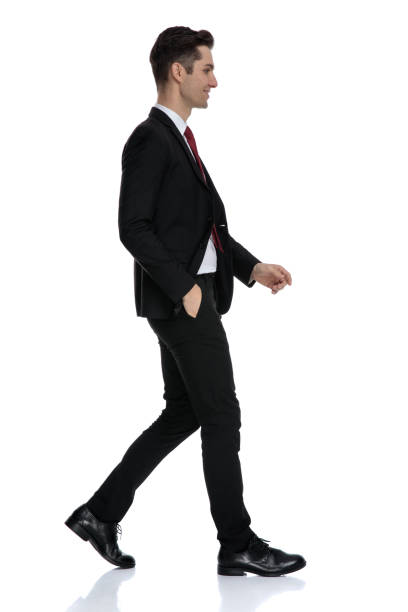 istock Side view of a cheerful businessman smiling 1184000164