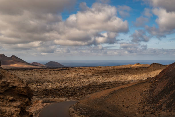 istock Timanfaya landscape with ocean view 1184001991