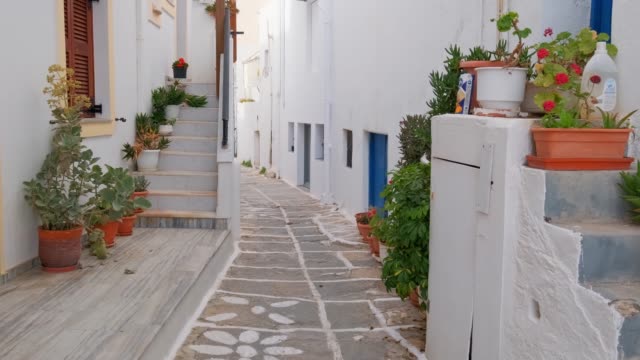 Walking in Naousa street on Paros island, Greece