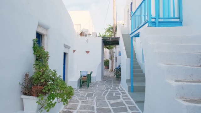 Walking in Naousa street on Paros island, Greece