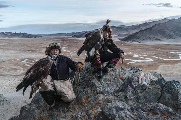 istock Portrait of two  eagle hunters in Mongolia 1184004849