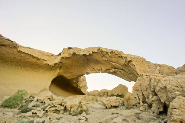 istock Natural Arch in the Desert 1184006007