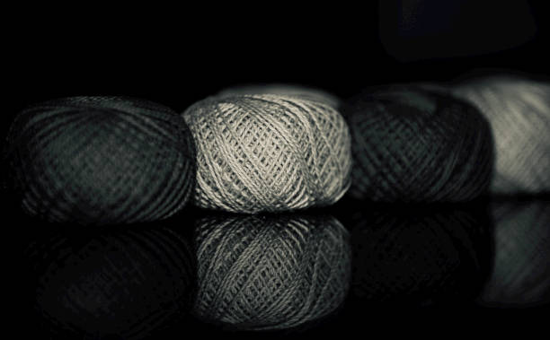 istock Stack of cotton yarn balls for weaving unique photo 1184007563