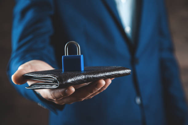 man hand holding lock in money on wallet