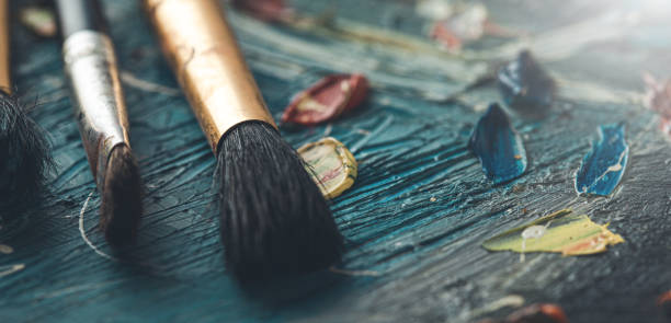 istock brushes on on the color picture background 1184007720