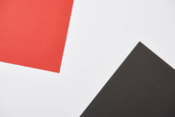 istock top view of red, white and black background with copy space 1184007849