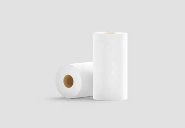 Photo of Blank white two paper towel mockup stand and lying