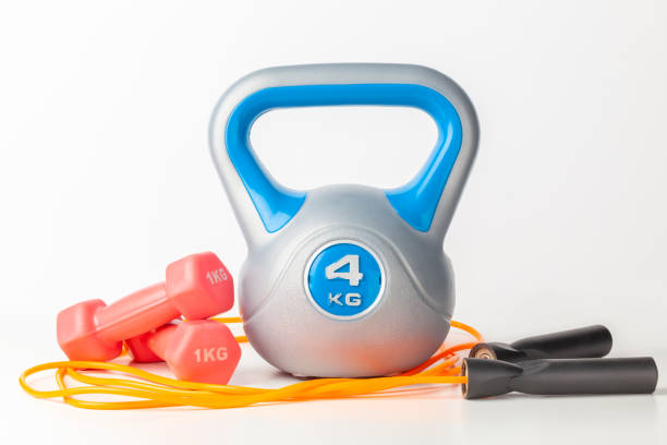 istock kettlebell, dumbbells and jump rope 1184010274