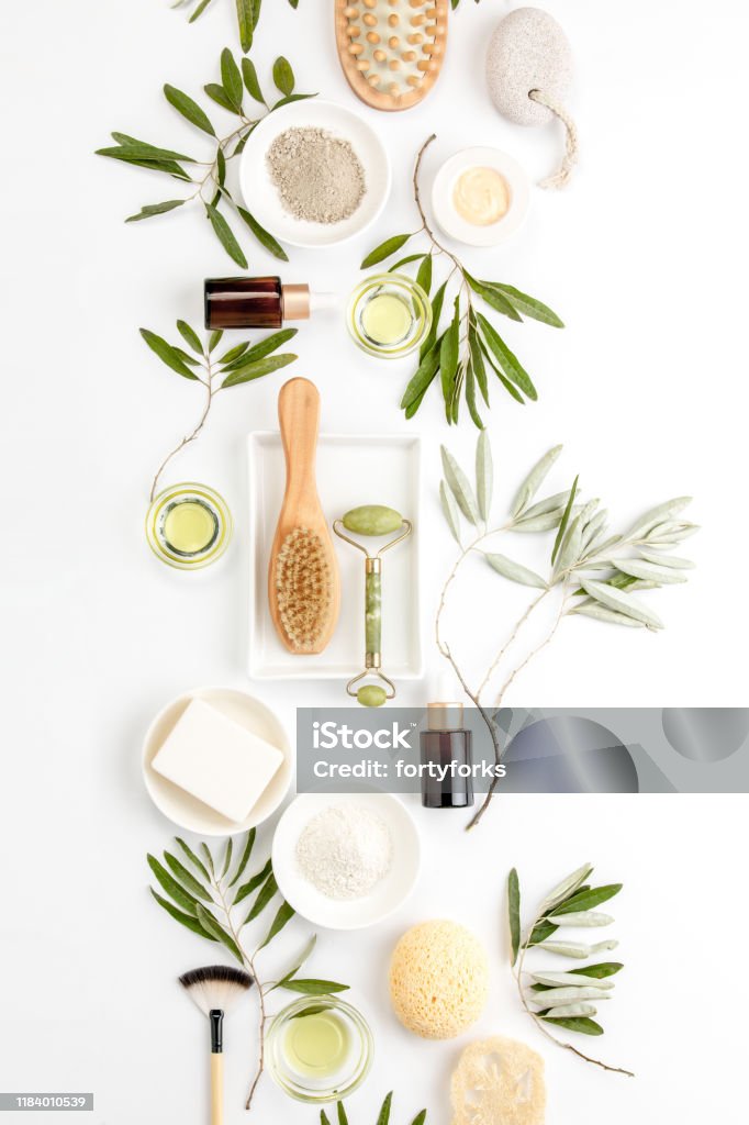 Spa concept with olive oil natural cosmetic ingredients Spa concept with olive oil and olive leaf extract natural cosmetic ingredients, flat lay composition Spa Stock Photo