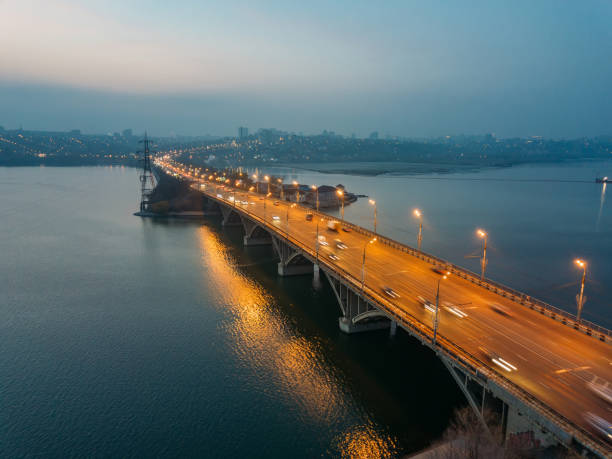 istock Evening autumn Voronezh. Vogresovsky bridge over Voronezh river, aerial view 1184018158