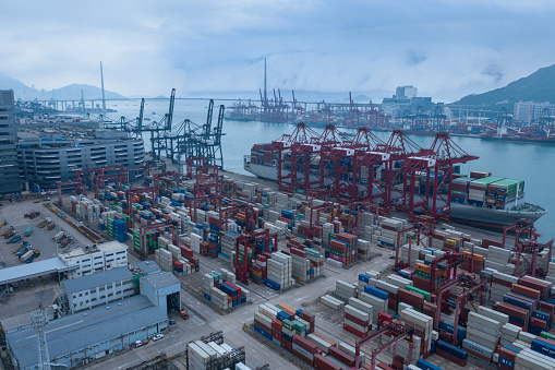 Containers loaded in Hong Kong port, storm