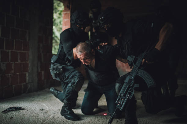 istock Police Arresting Gangster 1184020601