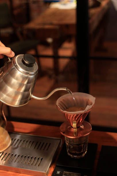 istock Barista at work in a cafe. Preparing pour over coffee 1184022430