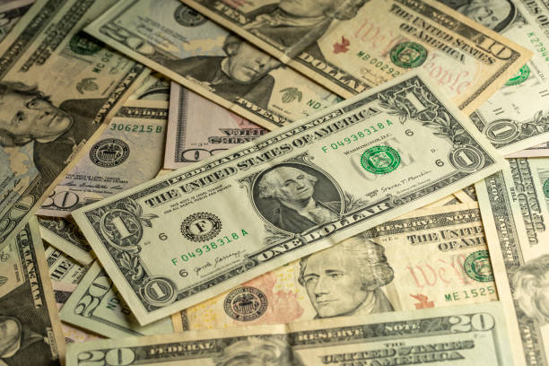 istock Money peso dollar 1184023994