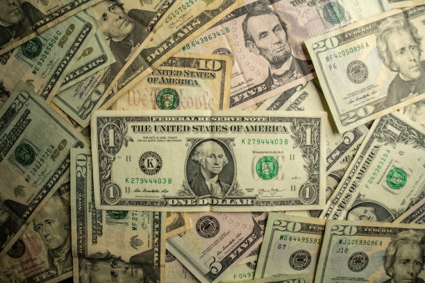 istock Money peso dollar 1184024121