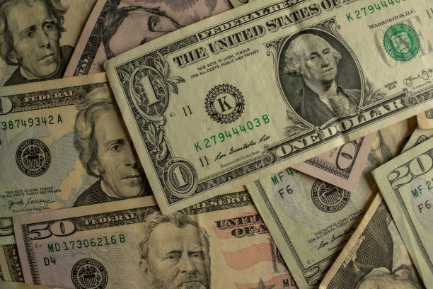 istock Money peso dollar 1184024202