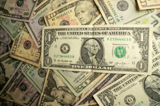 istock Money peso dollar 1184024219