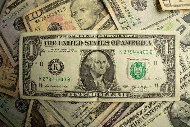 istock Money peso dollar 1184024235