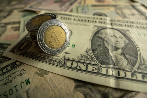 istock Money peso dollar 1184024449