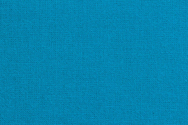 istock Sackcloth or burlap background with visible texture closeup, blue celestial color, natural canvas, pattern for backdrop 1184025671