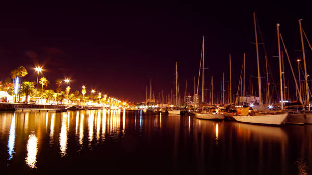 istock Barcelona Harbor nightscape water reflection ship wallpaper 1184027300