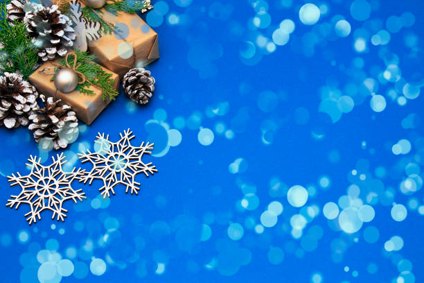 istock Christmas holidays composition on blue paper background 1184028006