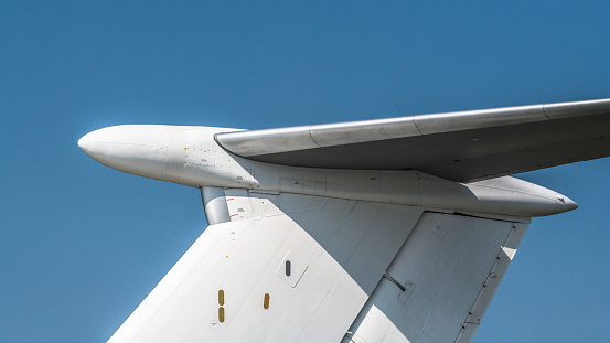 The tail of a large passenger jet at the international air show.