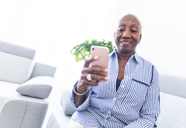 istock Tech Savvy Senior Woman Using a Smartphone 1184028553