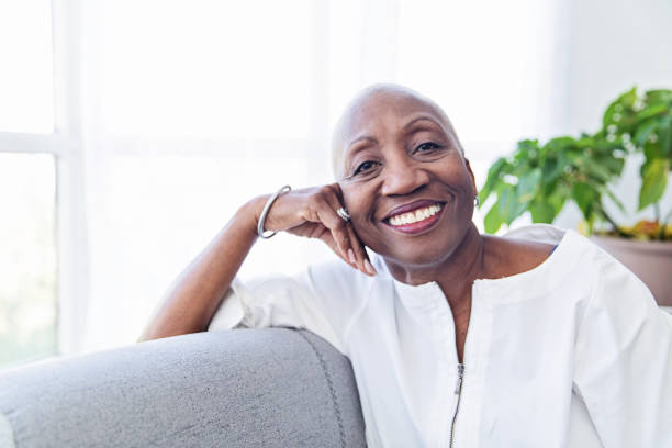 istock Senior Woman Relaxing on a Couch 1184028573