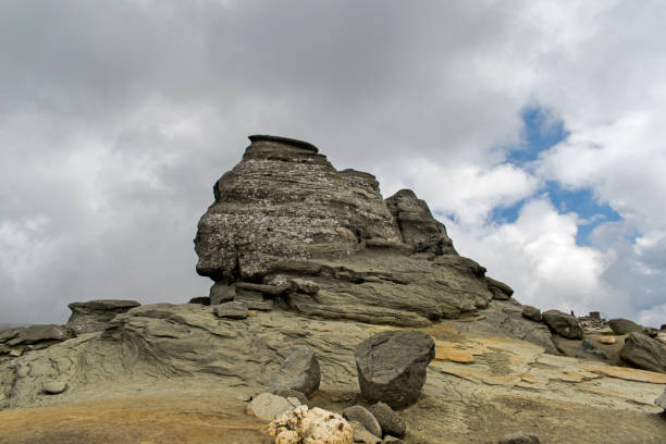 istock a rock whose shape resembles the head of a man. 1184029597